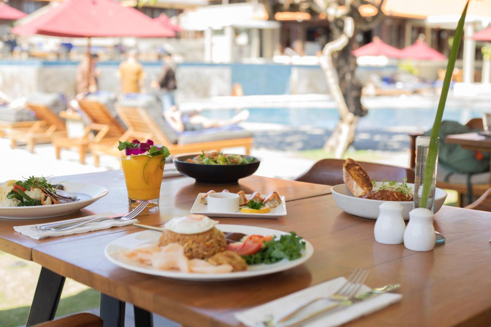 Bali Niksoma Boutique Beach Resort Легиан Экстерьер фото A meal at a restaurant